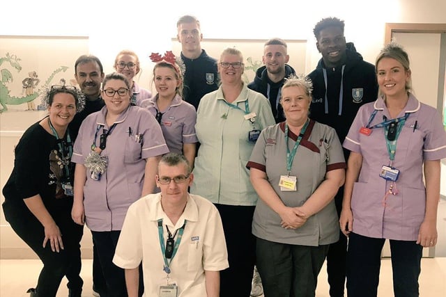 Sheffield Children's Hospital staff with Wednesday manager Jos Luhukay and players. in 2018.