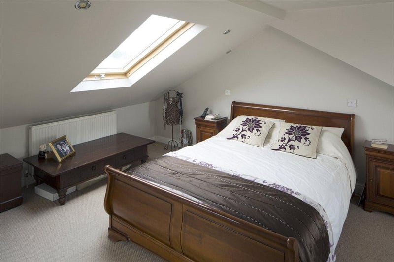 The room features ceiling down lighters, and velux window to the front and a rear window which provides fantastic distant views.