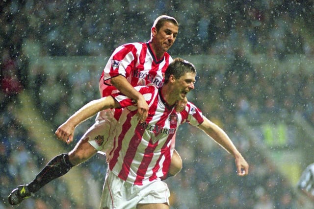 Niall Quinn celebrates with Kevin Phillips after scoring against Newcastle United. 