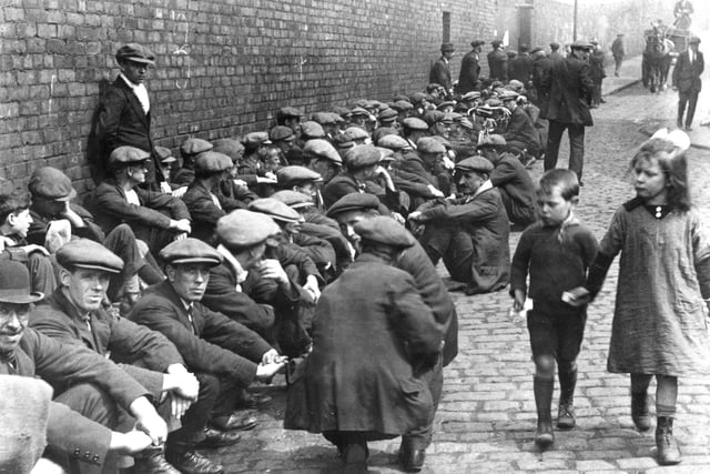Waiting outside the St Hilda Colliery in South Shields in 1926.
