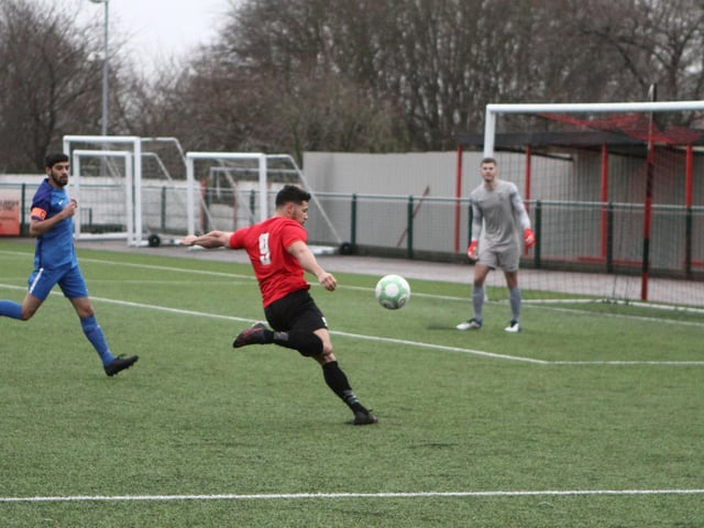 Kyle Stovell gets a shot in for the hosts.