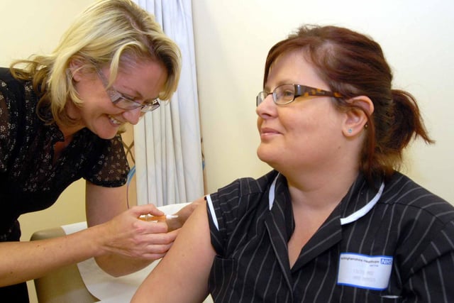 Louise Page Ward Manager at the Ashfield Health Village got her Swine Flu vaccine in 2009. Pictured with Rebecca Garner Senior Nurse