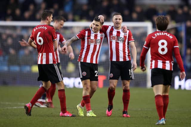 Mo Besic of Sheffield United celebrates with teammates after scoring his team's first goal during the FA Cup Fourth Round match between Millwall FC and Sheffield United at The Den on January 25, 2020 in London, England: Photo by Alex Pantling/Getty Images