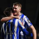 SHEFFIELD, ENGLAND - JANUARY 07: Josh Windass of Sheffield Wednesday celebrates with team mate Michael Smith after scoring their sides second goal during the Emirates FA Cup Third Round match between Sheffield Wednesday and Newcastle United at Hillsborough on January 07, 2023 in Sheffield, England. (Photo by Laurence Griffiths/Getty Images)