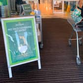 Earlier this year Morrisons put out signs to say there would be no entry for people not wearing a mask, although it has not said it will be enforcing the same policy this time. Photo by PAUL ELLIS/AFP via Getty Images.