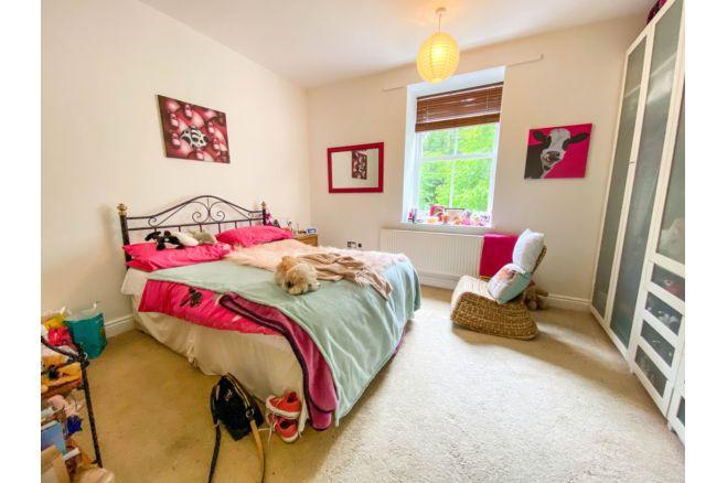 This is one of three double bedrooms in the property and has good storage options.