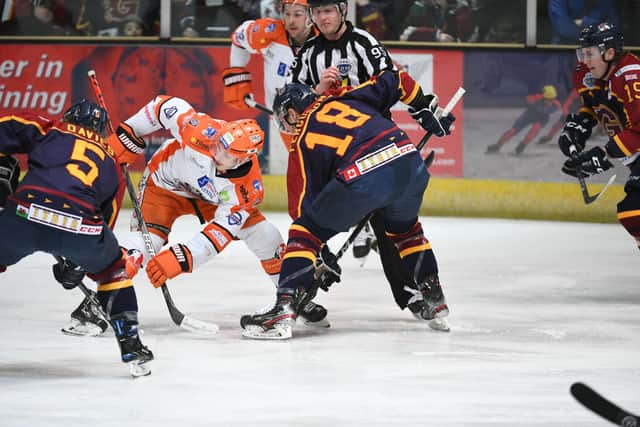 Tanner Eberle in face off action at Guildford