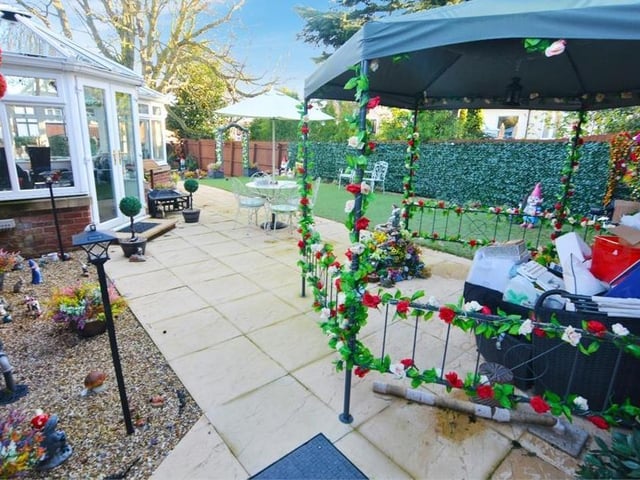 And so we move outside, where a large, wraparound, landscaped garden adds to the appeal of the property. A spacious patio area is ideal for outdoor seating and entertaining family and friends. Space too for a barbecue.