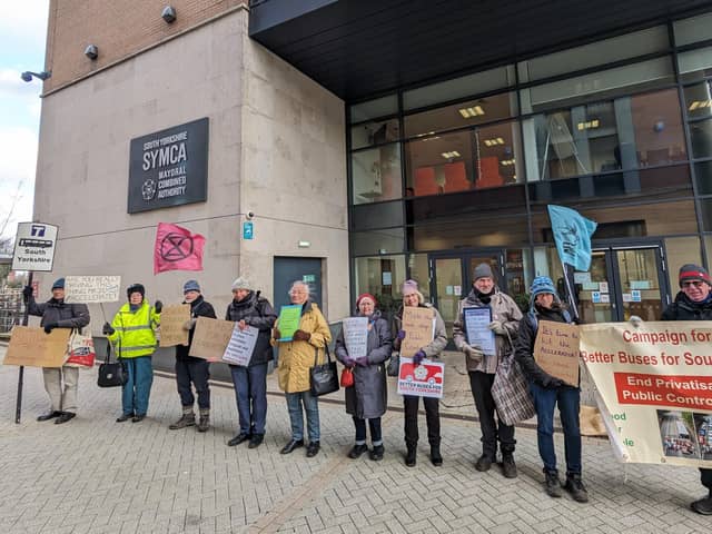 Supporters of Better Buses for South Yorkshire forming a bus queue outside the South Yorkshire Mayoral Combined Authority in Sheffield to call for faster action on bringing services back under public control. Picture: Better Buses for South Yorkshire