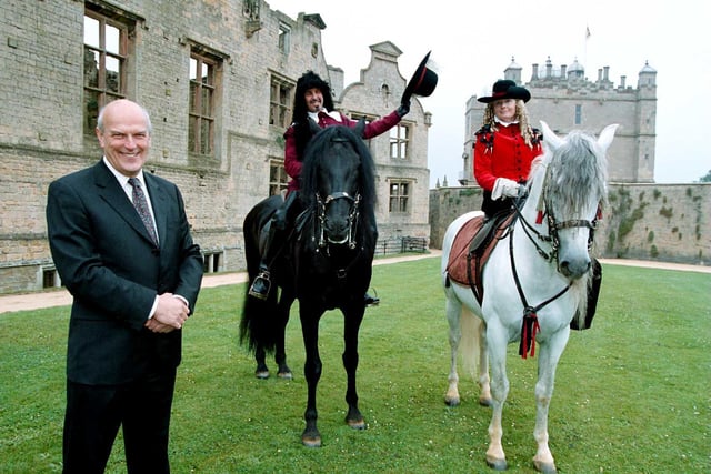 Opening of Historic Bolsover Castle  in Derbyshire after completion of £3.6 million  restoration project in 2000. Chairman of National Heritage  Sir Neil Cossons  stands with horses and riders from 'Horses Historia'  who performed in riding house to mark the official opening.