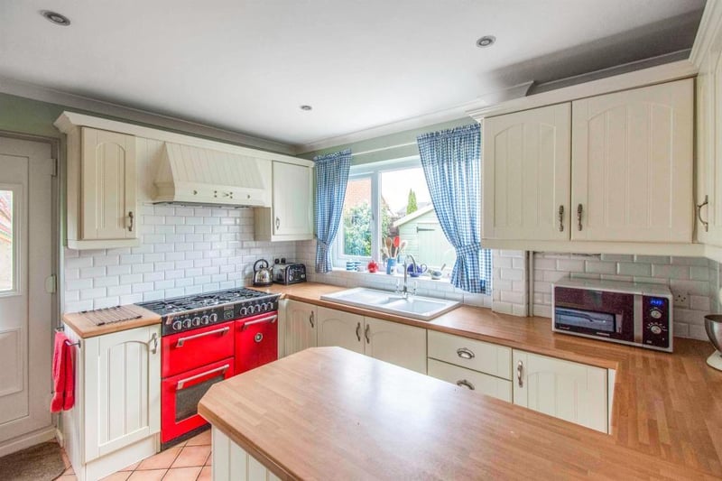 The kitchen has a ceramic sink and drainer with mixer tap, space for a  range master cooker  There are front, side and rear facing double glazed windows providing plenty of natural light, a pantry ideal for additional storage, down lights and a  door which gives access to the gardens.
