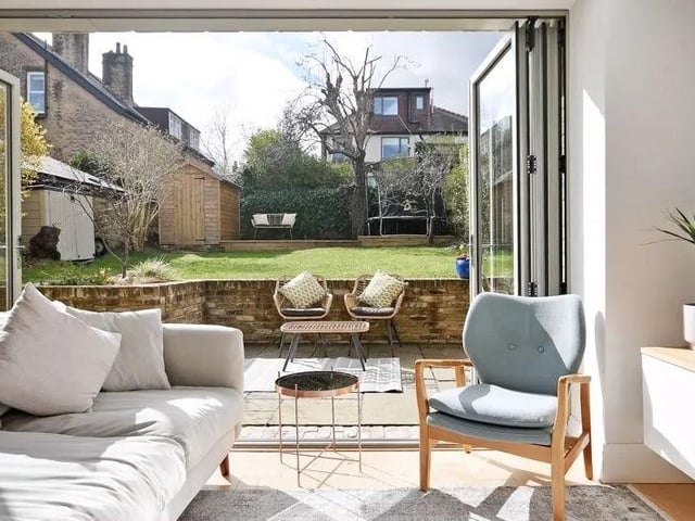 The rear of the property opens up onto the garden.