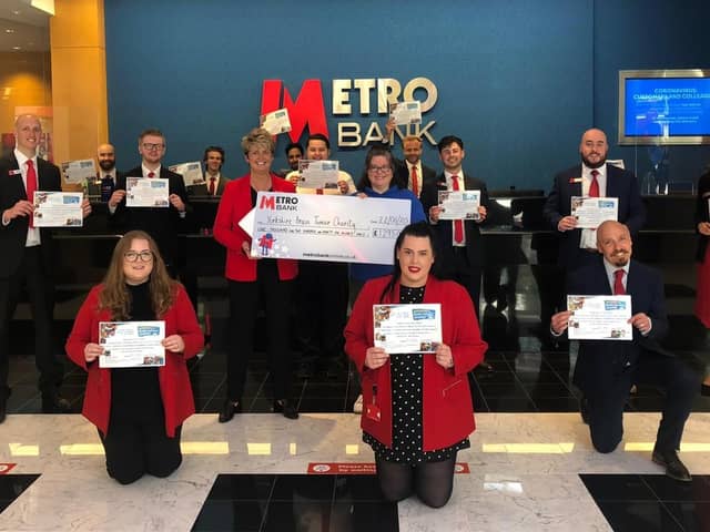 Staff at the Sheffield branch of Metro Bank following a charity event which raised £1,250 for the Yorkshire Brain Tumour Charity