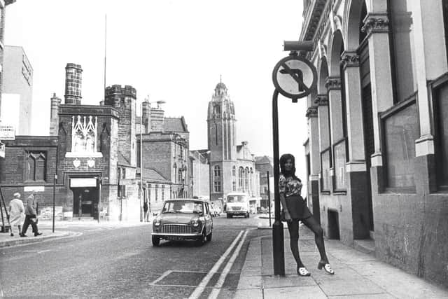 Mini skirt and Mini car in Norfolk Street, 1971