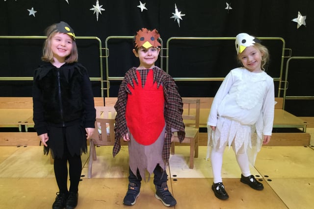 Children prepare for their Christmas play in their vibrant animal costumes at St John Fisher school