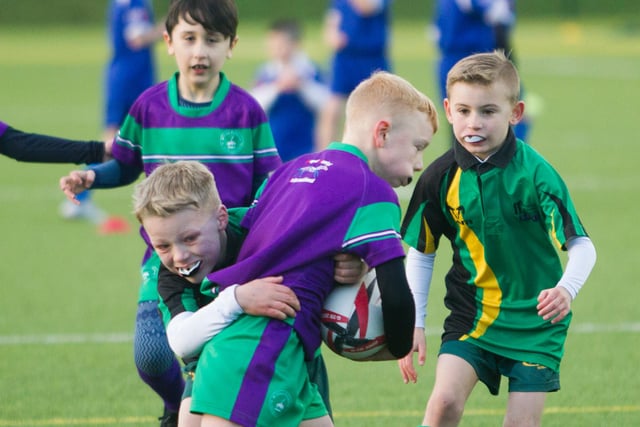 Ivan Watson, playing for Drumlanrig St Cuthbert's Primary, putting in a tackle at last Friday's festival