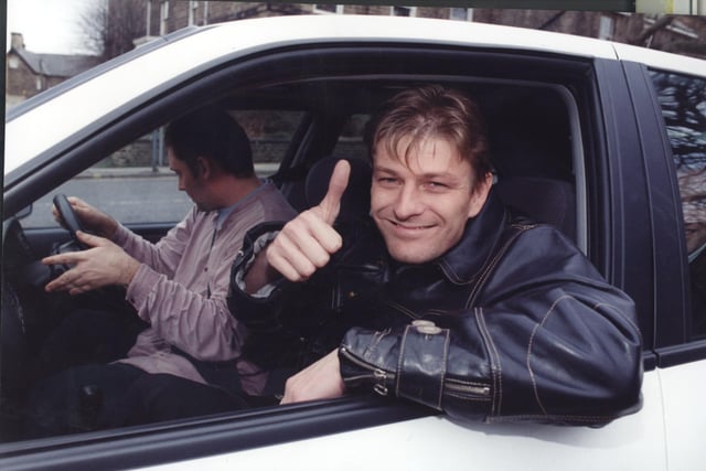 Sean Bean leaves Weston Park by car in January 1995 after being flown there by helicopter from London to continue filming football drama When Saturday Comes in the city