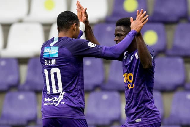 Beerschot's Musashi Suzuki and Beerschot's Ismaila Cheikh Coulibaly celebrate after scoring  (Photo by JASPER JACOBS/BELGA MAG/AFP via Getty Images)