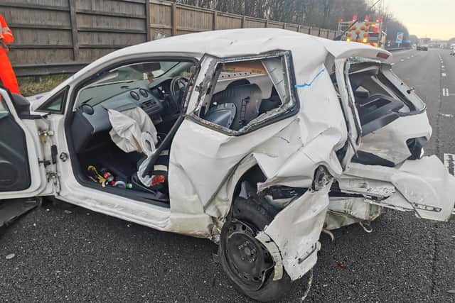 The aftermath of a crash on the M1, which police said happened after the driver of the Seat fell asleep at the wheel
