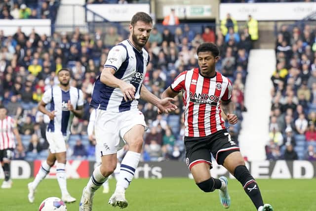Erik Pieters of West Bromwich Albion challenges Rhian Brewster, before the Sheffield United substituted was subbed: Andrew Yates / Sportimage
