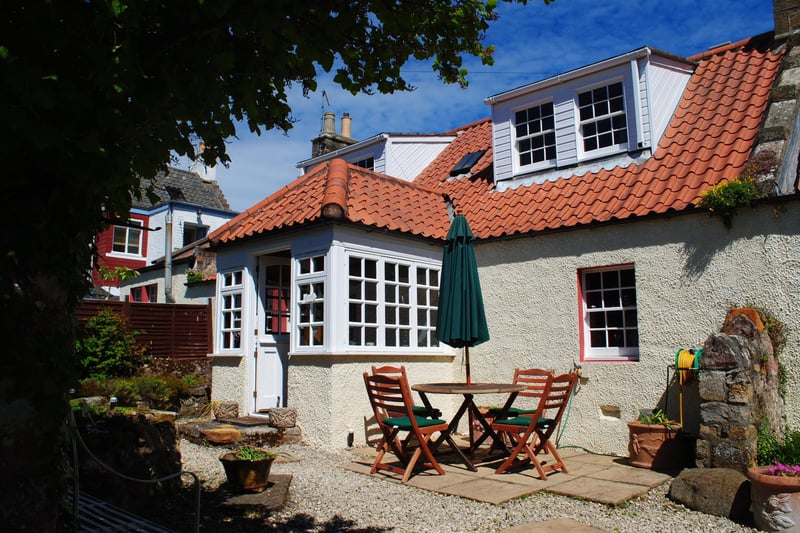 This beautiful traditional cottage, with private garden and a sunhouse, is just a short walk away from Crail's historic harbour in the heart of the East Neuk of Fife. It sleeps up to six people in three bedrooms and costs from £595 to £925 per week from www.fifecottages.co.uk.