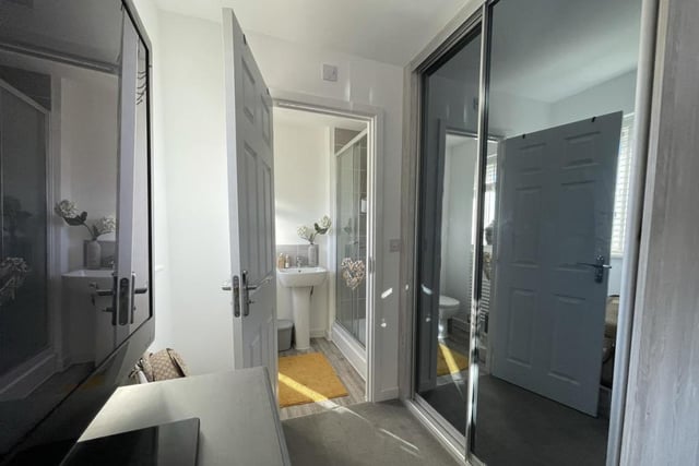 Both the master bedroom and the second bedroom boast fitted wardrobes with tinted glass sliding doors.