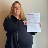 Louise Warburton with her letter telling vaccination centres she is allowed the jab.