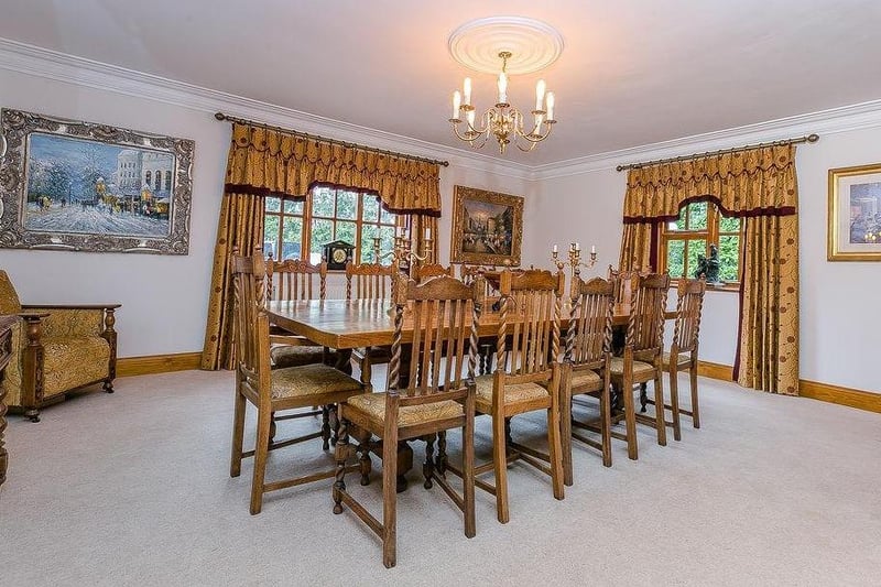 A set of double doors leads to this grand, double-aspect dining-room. It is an excellent place to seat up to 18 people.
