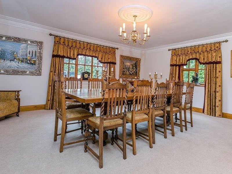 A set of double doors leads to this grand, double-aspect dining-room. It is an excellent place to seat up to 18 people.