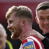 Tommy Doyle of Sheffield United celebrates with manager Paul Heckingbottom after victory over Blackburn Rovers: Andrew Yates / Sportimage