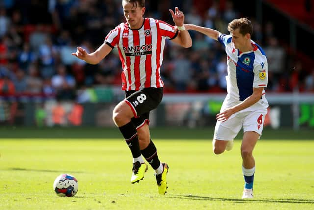 Sander Berge of Sheffield United and Tyler Morton of Blackburn Rovers during the Sky Bet Championship match at Bramall Lane: Simon Bellis / Sportimage