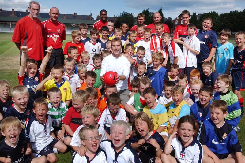 Sunderland footballer Jason McAteer was having a great time when he led this Soccer School for youngsters at Ashbrooke Cricket Ground in 2003.