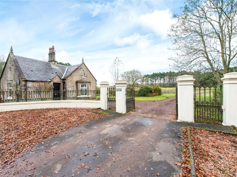 Main entrance gate and West Lodge.