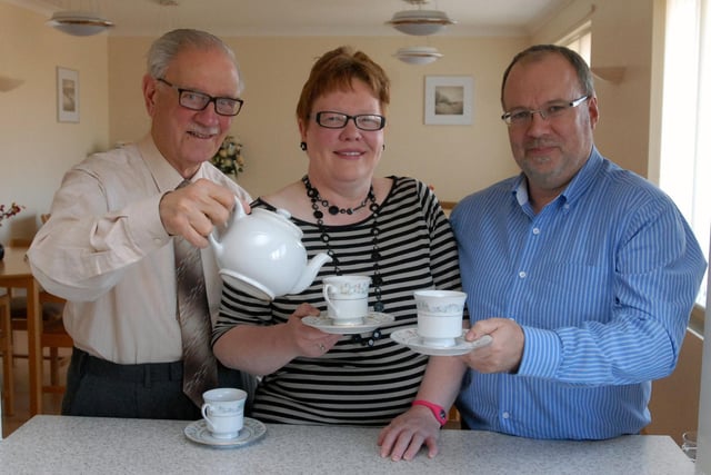 Raphael Attard and Catherine Elliot are pictured with David Hall at St Clare's enjoying a cuppa in 2012 but what was the occasion?