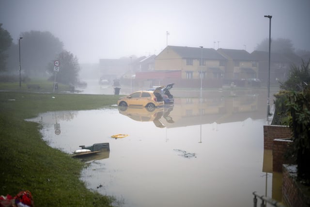 ROTHERHAM, UNITED KINGDOM - OCTOBER 23: Flood waters begin to recede in the village of Catcliffe after Storm Babet flooded homes, business and roads on October 23, 2023 in Rotherham, United Kingdom. The UK Environment Agency has warned that flooding could last for days in the wake of Storm Babet with 116 flood warnings remaining in place across England. (Photo by Christopher Furlong/Getty Images)