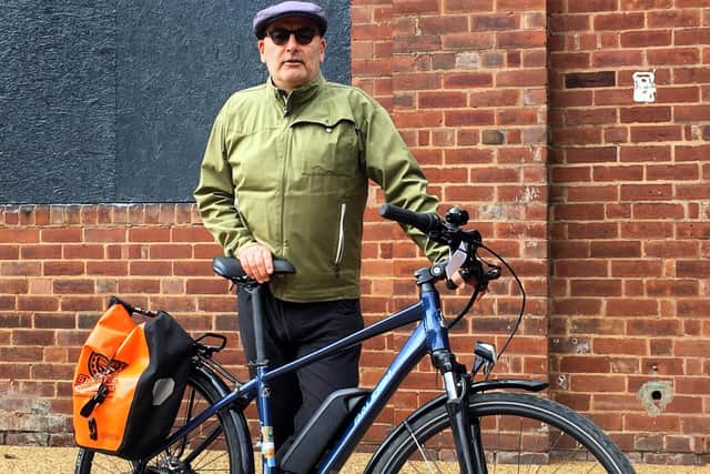 Nurse Ian Carey with his CycleBoost e-bike