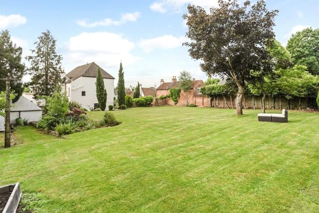 Another view of the large garden at the rear of the £1,175,000 house in Southwell. Imagine summer days relaxing here or playing a few games with the children.