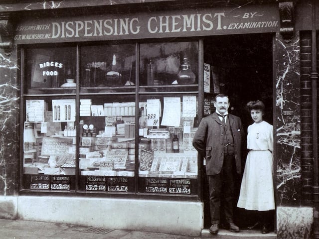 Mr Haining and his daughter pictured at the Dispensing Chemist, Heeley Green - Submitted by Sid Wetherill, Heeley History Group