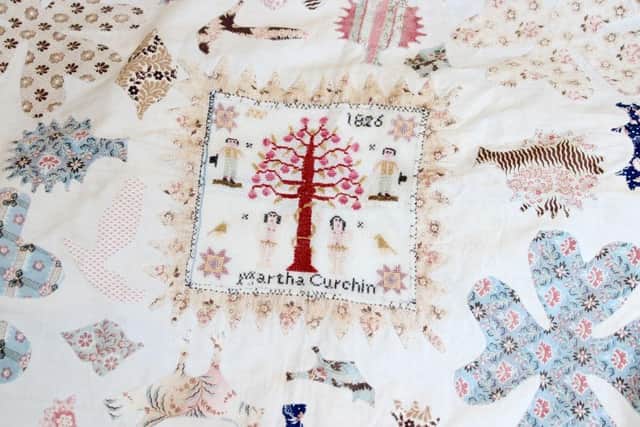 Detail from an early 19th Century Cotton Coverlet with Sampler – estimate: £500-800 plus buyer’s premium.