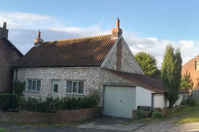 Located on Front Street, Wold Newton, Driffield, YO25, this two bed cottage boasts extensive mature gardens, and is situated approximately nine miles south of Scarborough and nine miles northwest of Bridlington. Property agent: Mark Stephensons. bit.ly/2H4tBrH