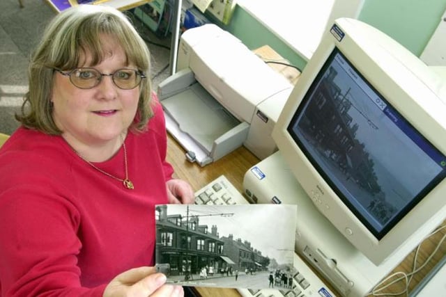 Community development worker Lisa Davis inputting a photo of Balby into the system as part of the Doncaster Library Services Doncaster Community Activities Project in 2002.