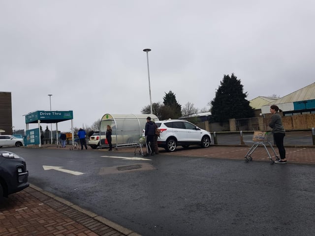 Shoppers pictured up to two car parking spaces apart from each other as they queue outside supermarkets across Scotland. As of today COVID-19 cases reached 894 and three more patients died after contracting the virus making the death toll 25.