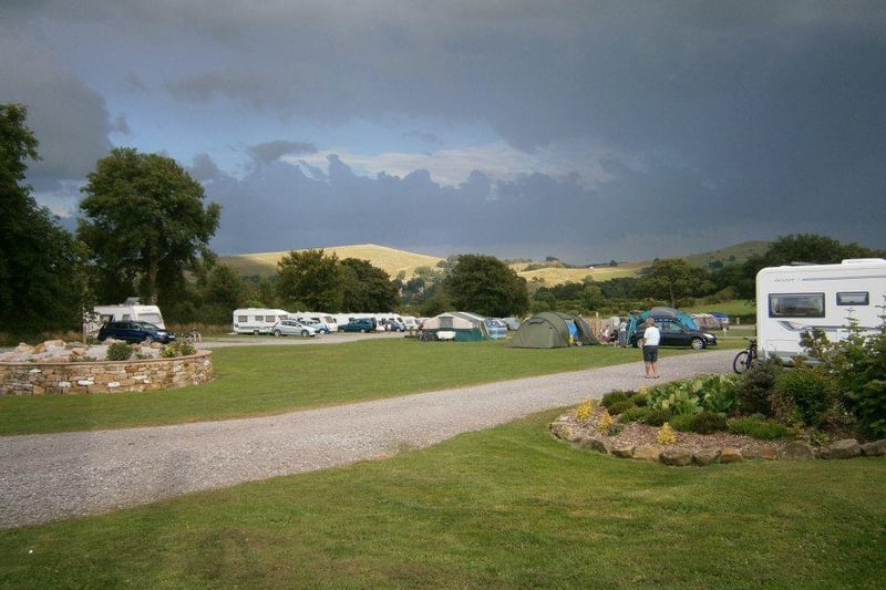 The camping and caravanning pitches at this award-winning site are on a gentle sloping field and offer stunning views of the surrounding rural landscape. There's a huge playing field for children to run around in and a smaller playing area for younger children. The campsite owners have four miniature Shetland ponies which are a big hit with young  visitors. Families who own four-legged friends can exercise them on a purpose designed dog walk around the perimeter of the site. Go to www.upperhurstfarm.com