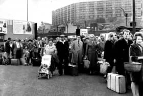Holidaymakers queue at Sheffield's Pond Street bus station on a bank holiday weekend in 1962 to catch their seaside-bound coaches