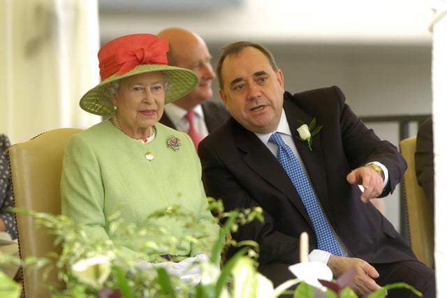 Her Majesty Queen Elizabeth II at the opening of the third Scottish Parliament at Holyrood, Edinburgh in 2007. The Queen watches the procession walk past along with then First Minister Alex Salmond.