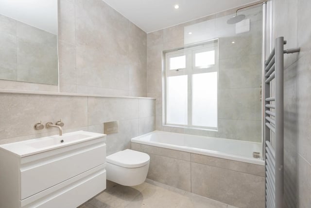 Like the rest of the house, the bathroom is finished in a contemporary style.