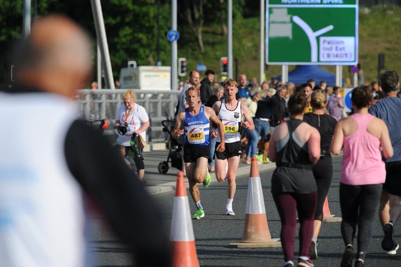 Runners cross the Northern Spire Bridge as they take part in Sunderland City Runs 5k event.