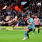 Anel Ahmedhodzic of Sheffield United attempts an audacious overhead kick against Burnley: Simon Bellis / Sportimage