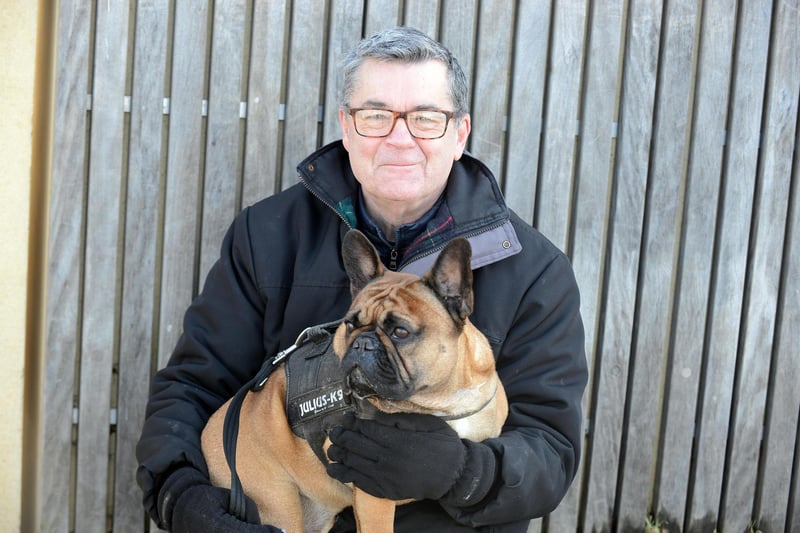 Steve Cowie with Louis the dog.