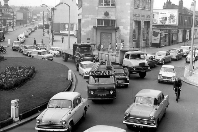 Junction of London Road, Cemetery Road and The Moor in October 1963. Barclays Bank and the Locarno Ballroom (former Lansdowne Picture Palace) in background.